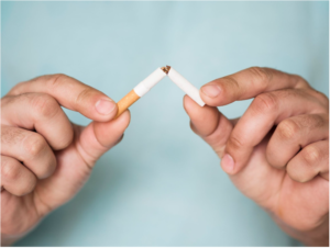 man breaking cigarette