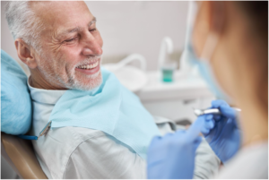 patient smiling at dentist